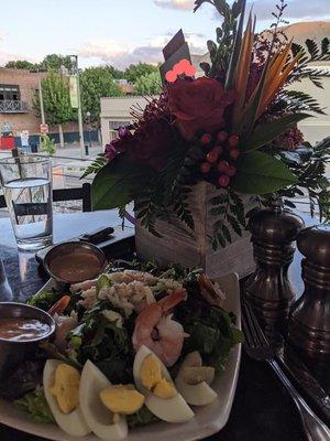 Boxed tropical arrangement delivered to the restaurant (Campbell's Veranda).