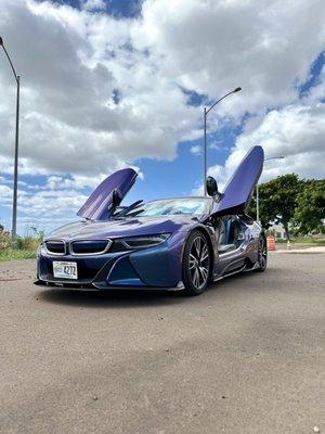 After, front 3/4 view of 2019 BMW i8 Roadster