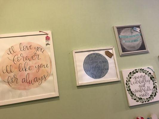 Cute framed quotes for a nursery.