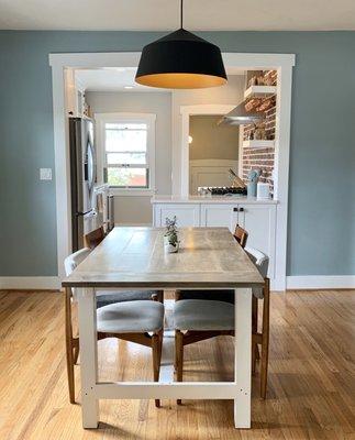 Our finished kitchen after Helton Enterprises opened up the wall from a single doorway size and matched the trim.