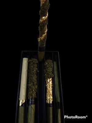 Our custom pre rolls. With 24kt gold.