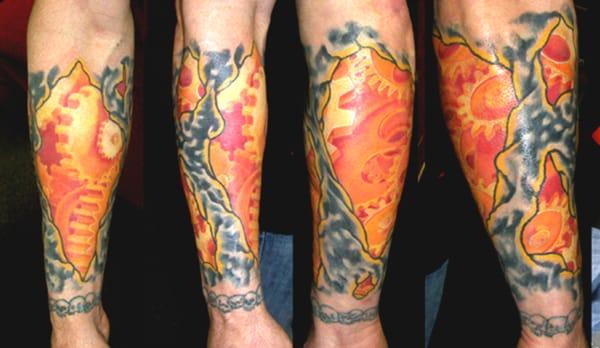 Difficult gear tattoo I did in 2007!  So much fun. I saw this about a year ago on my client. Held up colors very well.  Mace