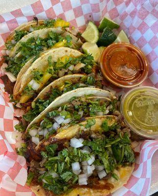 Alpastor and Asada Tacos with green and red salsa