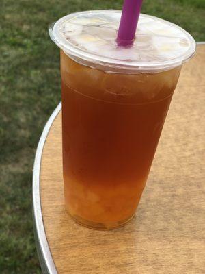 Black tea with peach and mango.