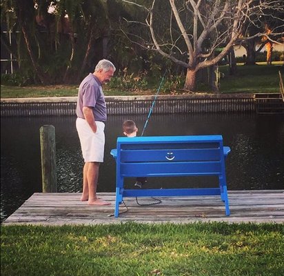 Fishing with grandpa in our new dockside bench.