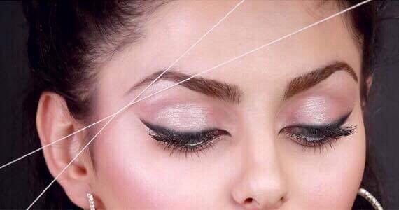 Eyebrows threading