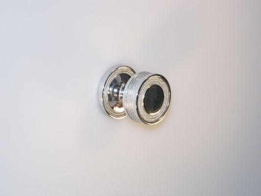 Solid brass door knobs shown in polish nickel finish