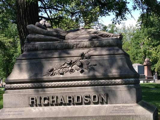 Here grave monument is spectacular. Lying in a cement slab for eternity.