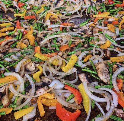 Fresh veggies getting the grill treatment for our vegetarian friendly Grilled Veggie Quesadillas.