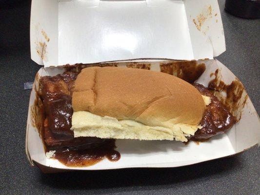 McRib half the bun missing and no peppers and onions