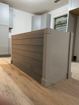 Custom built kitchen island with the addition of shiplap along backside to add appeal.