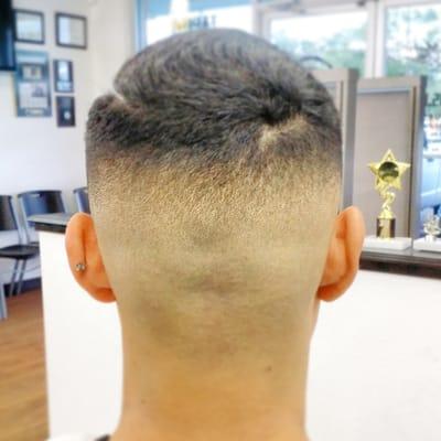 Mid high skin fade. Clean and smooth.