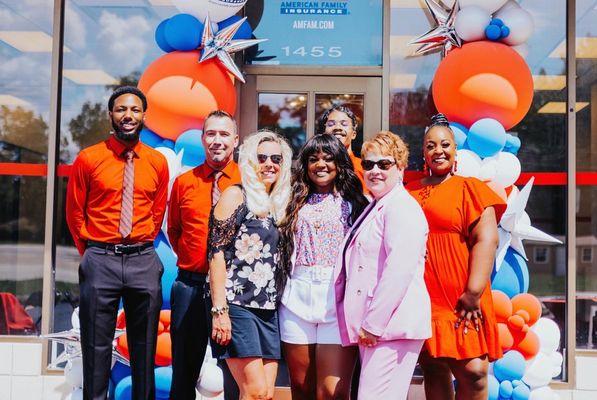 Taryn Mychals Darrington (middle) and team celebrating the T-Mychals Darrington Agency, LLC. Grand Opening