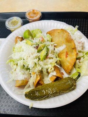 Taquitos and hard shell taco~beef