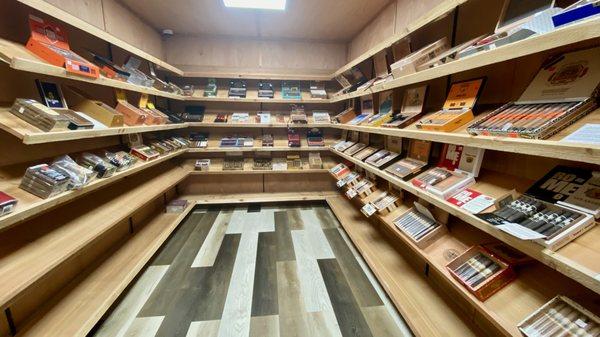 We have a humidor with a selection of premium cigars.