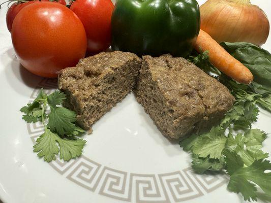 Meatloaf! Our flavorful mix of seasoned ground beef, mixed vegetables, and bread crumbs baked in a loaf shape.