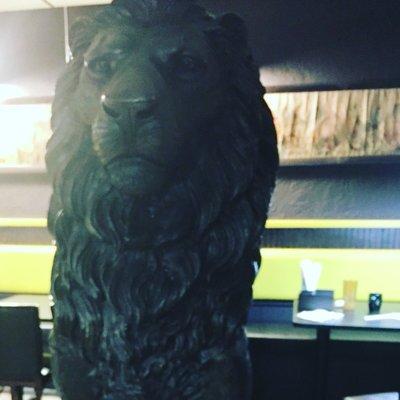 This is the awesome gigantic metal lion that greets you inside this restaurant