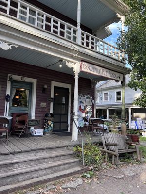 Hardware store on the left.  The door on the right for the restaurant.