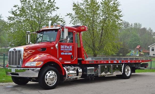 Gorgeous medium duty Peterbilt flatbed tow truck for in-house towing