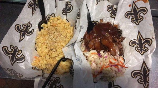 Crawfish mac and cheese, brisket, and coleslaw