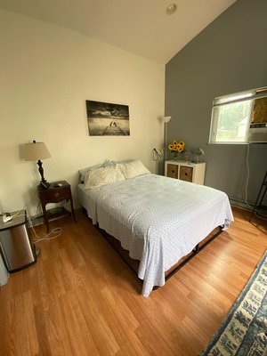 Guest bedroom renovation: walls painted, new flooring