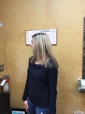 Blonde highlights with a long layered haircut