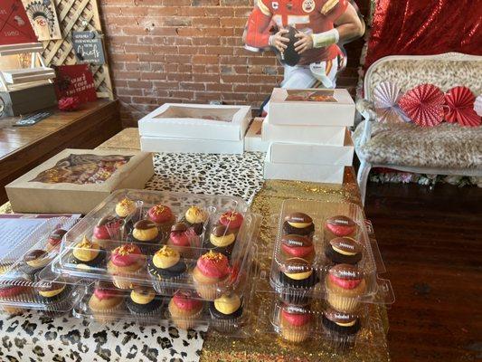 Cupcakes & boxes of decorated sugar cookies