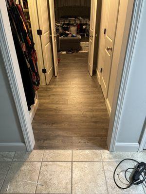 Installed new flooring in hallway to bathroom.