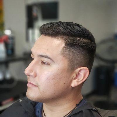 Shadow fade with a combover. Shearwork on top. Crispy razor line up on everything