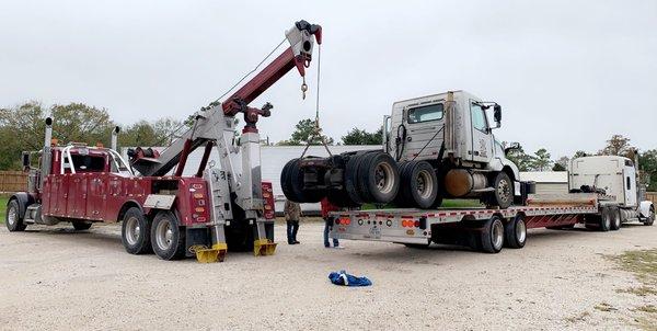 Winching truck onto trailer