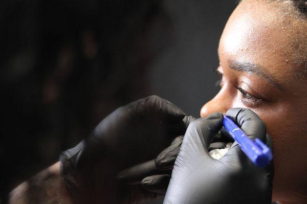 Marking a nostril piercing