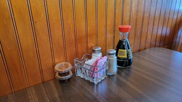 Condiments on the table-- We liked that the chili sauce was in its own small containers