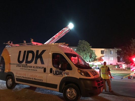 UDK carpenter responding in the middle of the night for a call to board-up a burned structure.