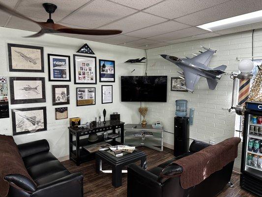 Patriot Barbershop's comfortable lounge area rich in military honor, aviation, and history!