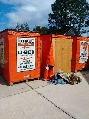 Unloading uhaul pods for a customer.