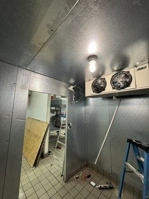 Enhancing Commerical Kitchen Security: 4K Cam Installation in progress for Walk-in Cooler call us