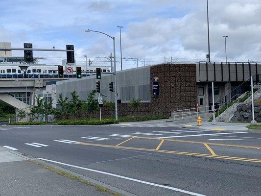 Here's a picture of where to enter the free parking ramp, looking NW from the south side of 103rd