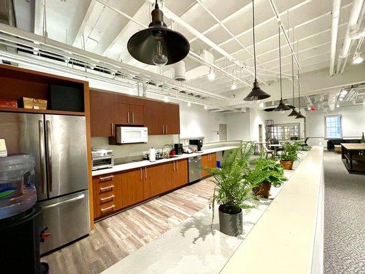 A modern and well-stocked kitchenette on the first floor