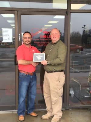 Alan Pearcy, owner of Pearcy Auto Sales, receives ASC's Quality Dealer Award for the 13th consecutive year in a row.