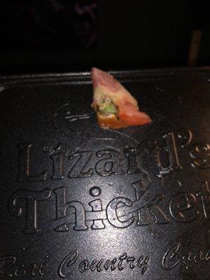 Quick photo of a piece of tomato on my side salad...