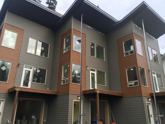 Girdwood 4 plex with 2 different types of steel siding