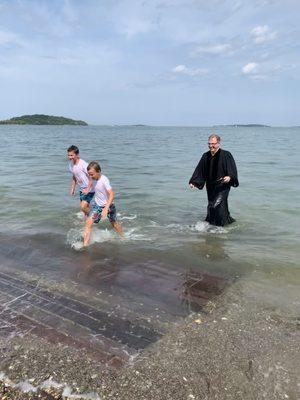 Open ocean baptism with Father Gray