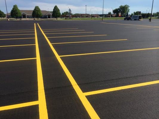 Parking lot striping and sealcoating