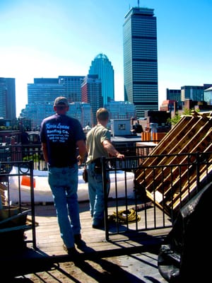 Our crew going to meet the crane to load supplies near Copley Square in Boston.