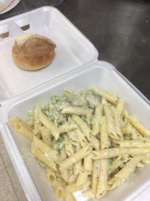 Chicken and broccoli alfredo pasta , served with homemade bread !