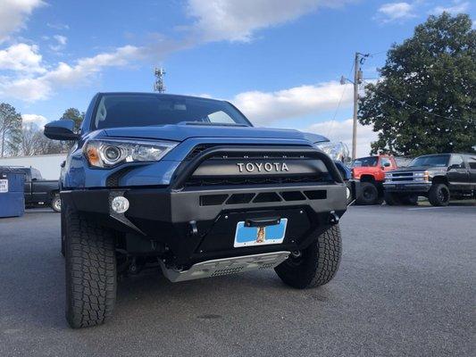 Front Bumper Install.  Bottom half of manufacturer bumper had to be cut to install the aftermarket CBI bumper.