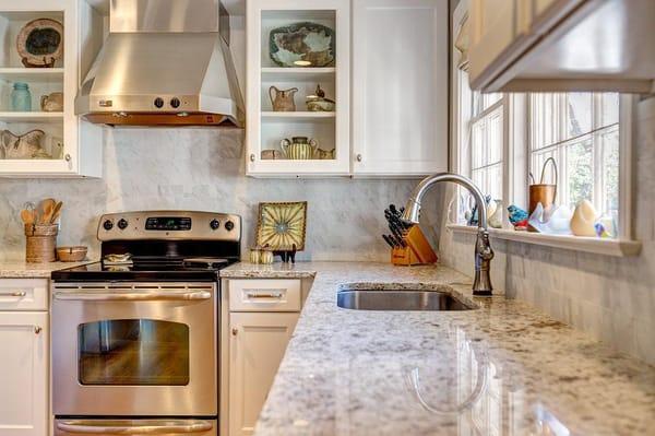 The beautiful granite countertop highlights this wonderful new kitchen space!