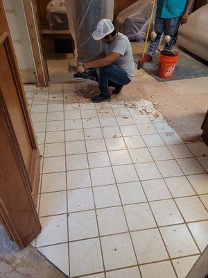 Before - Old flooring being removed