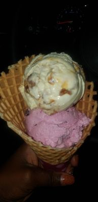 Pralines and cream and cherry jubilee in a waffle cone