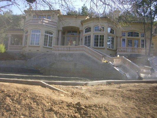 stucco stone veneer custom entrance way stairs